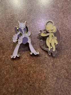 Pokemon 2 Enamel Pin Set - Mega Mewtwo X + Mega Mewtwo Y Blister Pack Pins - Image 1