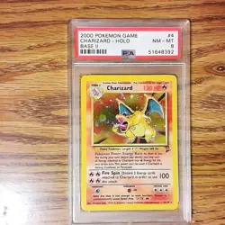 Charizard 4/130 BASE 2 Graded Pokemon Card - PSA 8 - NM MT - Swirl - Image 1