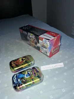 Pokemon Prismatic Evolutions Surprise Box Booster Bundle Sam’s Club 2 mini tins - Image 2