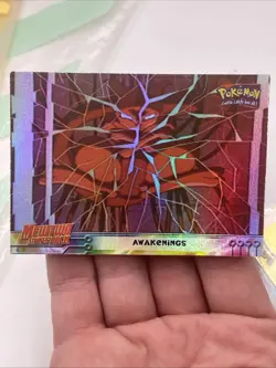 1999 Topps Mewtwo Strikes Back Rainbow Foil Blue Logo #2 Awakenings NM - Image 1