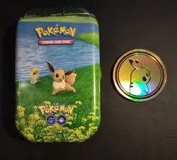 Pokemon Go Eevee & Meltan Tin No Cards W/ Pikachu Coin Empty - Image 1