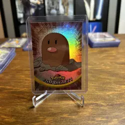 Diglett Pokemon Topps Series 1 - 50 First Print L- Silver Foil - Image 1