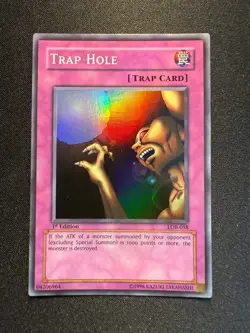 Yu-Gi-Oh Trap Hole LOB-058 1st Edition Super Rare Asian English - Image 1