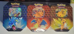 Pokemon Hidden Fates Tins (Set of 3 Tins) - Charizard, Raichu, Gyarados Art Set - Image 1