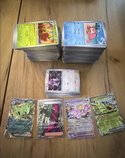 Pokemon Prismatic Evolutions Lot ( 479 Basic, 29 Holo, 3 exs, 1 Rare Full Art) - Image 1