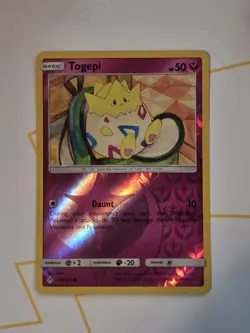 Togepi 136/214 2019 SM Unbroken Bonds Pokemon Card Reverse Holo Common - Nm - Image 1
