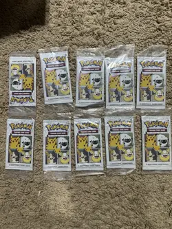 (Lot of 10) Pokemon TCG: 25th Anniversary General Mills Cereal Packs - Image 1