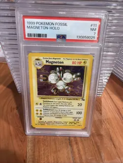 1999 POKEMON FOSSIL #11 MAGNETON-HOLO PSA 7 - Image 1