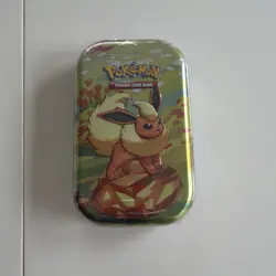 Pokemon TCG Prismatic Evolution Mini Tin Flareon New Sealed - Image 1