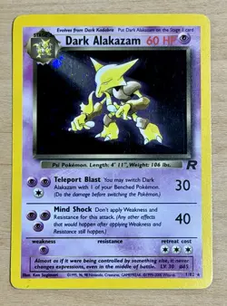 Dark Alakazam 1/82 Holo Rare Unlimited Team Rocket Pokemon w/ Swirl - Image 1