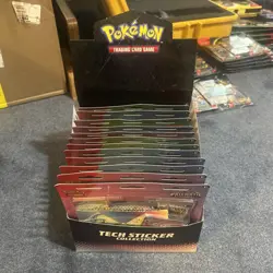 Pokemon TCG Prismatic Evolutions Tech Sticker Case of 12 - Image 1