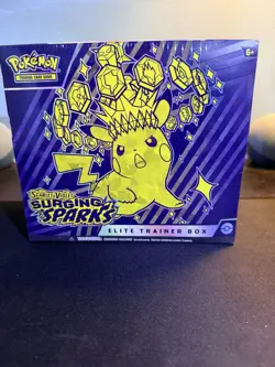 Pokemon TCG Surging Sparks Elite Trainer Box New Sealed With Slight Rip - Image 1