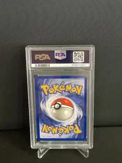 1999 Pokemon Base Set Alakazam Holo 1/102 PSA 7 NM - Image 2