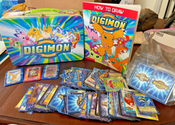 Digimon Metal Suitcase, 3lb of TCG, Drawing Book,& 3 Metal Taco Bell Cards LOT - Image 1