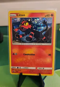 Pokemon 2016 Sun and Moon Black Star Promos #SM02 Litten - Image 1