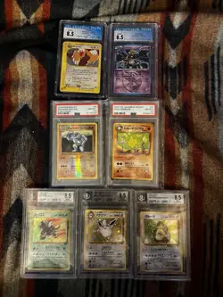 Pokemon Bundle Lot Of 7 Graded 8.5 Cards Beckett, CGC, & PSA - Image 1