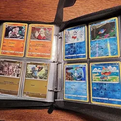 Charizard binder full of only Holo/Reverse Holo Pokemon TCG cards - Image 1