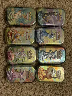 Pokemon Prismatic Evolutions Mini Tins (Complete Set of 8) - SEALED - Image 1