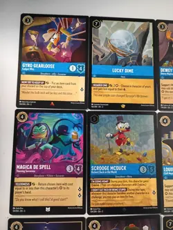 Lorcana Duck Tales Lot 13 Cards (1 Scrooge Mcduck Foil 154/204) - Image 2