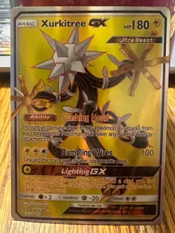 2017 Pokemon Xukitree GX Ultra Beast Gold Holo 142/138 - Image 1