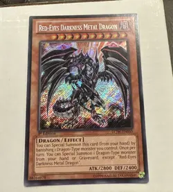 Yugioh LCJW-EN050 RED-EYES DARKNESS METAL DRAGON Secret Rare 1st Edition (NM) - Image 1