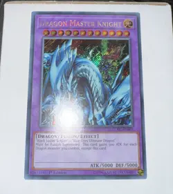 Yugioh LCKC-EN065 DRAGON MASTER KNIGHT SECRET RARE 1ST EDITION (NM) - Image 2
