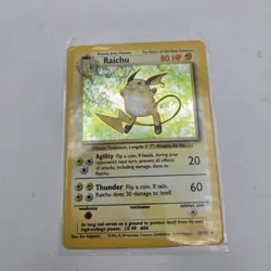Pokemon TCG Raichu Holo Rare Base Set 14/102 WOTC 1999 Vintage Holo Card - Image 1