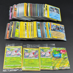 Lot of 200+ Assorted Pokemon Raw Cards V's Holo's Promo from Tins and Boxes - Image 2