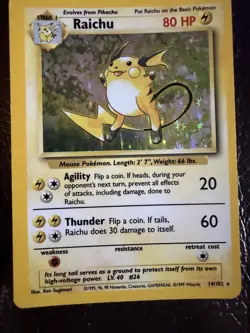 Pokemon TCG Raichu Base Set 14/102 Holo Rare 1999 Wizards Copyright Card - Image 1