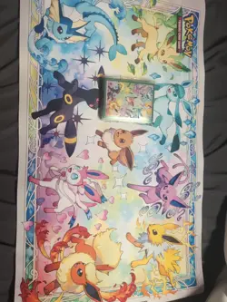 Pokemon TCG Prismatic Evolutions SPC Playmat and Sleeves - Image 1