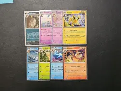 Pokemon - Costco Tin Prismatic Evolutions Promo Set - Cosmic Swirls Holo - Image 1
