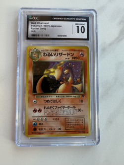 CGC 10 GEM MINT 1997 Dark Charizard Team Rocket Gang Japanese Holo Pokemon Card - Image 1