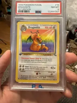 1999 POKEMON TCG FOSSIL #19 DRAGONITE 1ST EDITION - PSA 8 NM-MT Non holo - Image 1