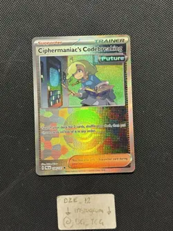Pokemon Prismatic Evolutions - Ciphermaniac’s Codebreaking - 104/131 - Pokeball - Image 1