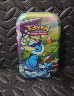 Pokemon TCG Vaporeon Mini Tin Prismatic Evolutions – Factory Sealed Unopened - Image 1