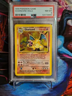 1999 POKEMON BASE SET UNLIMITED #4 CHARIZARD-HOLO PSA 8 - Image 1