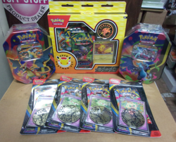POKEMON DAY BOX + (4) PHANTASMAL BLISTERS + (2) MEGA CHARIZARD EX TINS - Image 1