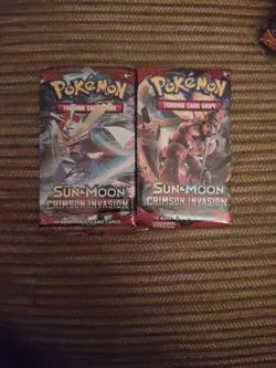 Pokemon Sun And Moon And Crimson Invasion Booster Packs - Image 1