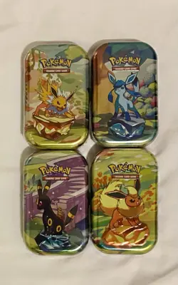 Pokemon Bundle Of 4 Prismatic Evolution Jolteon Umbreon Flareon And Glaceon Tin - Image 1