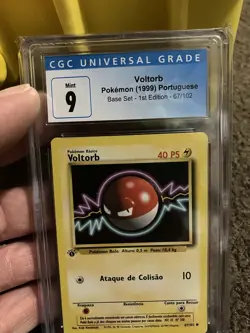 CGC 9 MINT Voltorb PORTUGUESE Base 1st Edition Pokemon Card 67/102 Top Pop 3 - Image 1