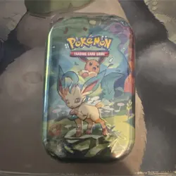 Pokemon Scarlet & Violet Prismatic Evolutions Mini Tin Leafeon Eevee TCG - Image 1