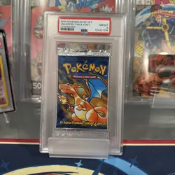 1999 Pokemon Base Set Booster Pack PSA 8 Charizard Art - Image 1