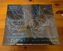 Phantasmal Flames Pokemon Center ETB New & Sealed (Small hole in wrap) - Image 1