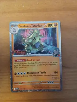 Pokemon TCG Destined Rivals Team Rocket's Tyranitar STAFF Promo - Image 1