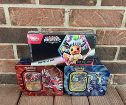 NEW-Pokemon Paldea Legends Tins-Koraidon EX & Miraidon EX/Prismatic Surprise Box - Image 1