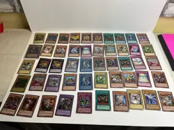 Lot Of 148 Holo Yugioh Cards - Image 1