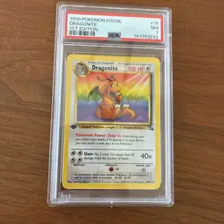 DRAGONITE 1999 POKEMEN FOSSIL 1ST EDITION RARE NON HOLO CARD 19/62 - PSA NM 7 - Image 1