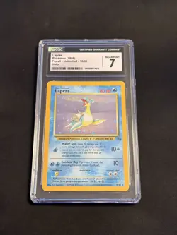 1999 Pokemon Fossil Lapras Holo 10/62 CGC 7 NM - Image 1