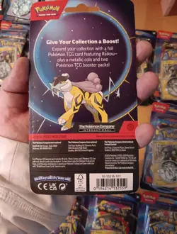 2026 Pokemon TCG Raikou Foil Promo Card With 2 Booster Packs & Coin - Image 2