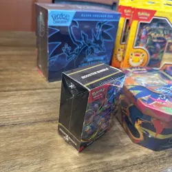 Pokemon TCG Phantasmal Flames ETB Booster Bundle Pokemon Day | Charizard Tins - Image 4